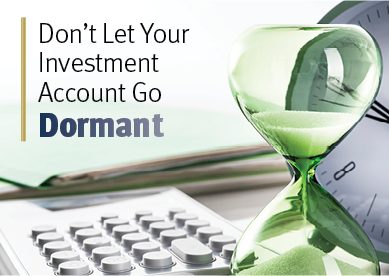 Don’t Let Your Investment Account Go Dormant image of green hourglass on desk with keyboard